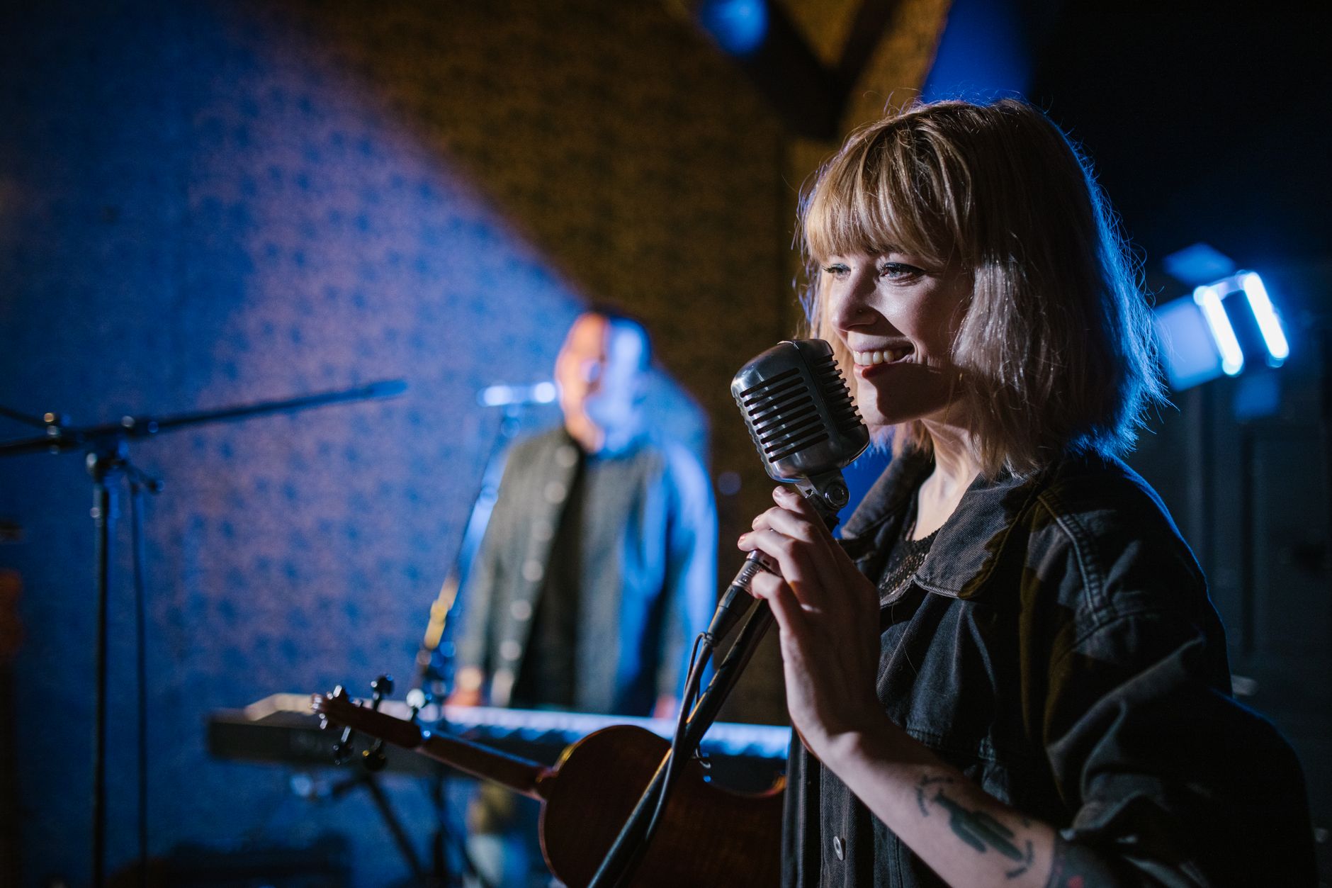 Singer performing live with a microphone