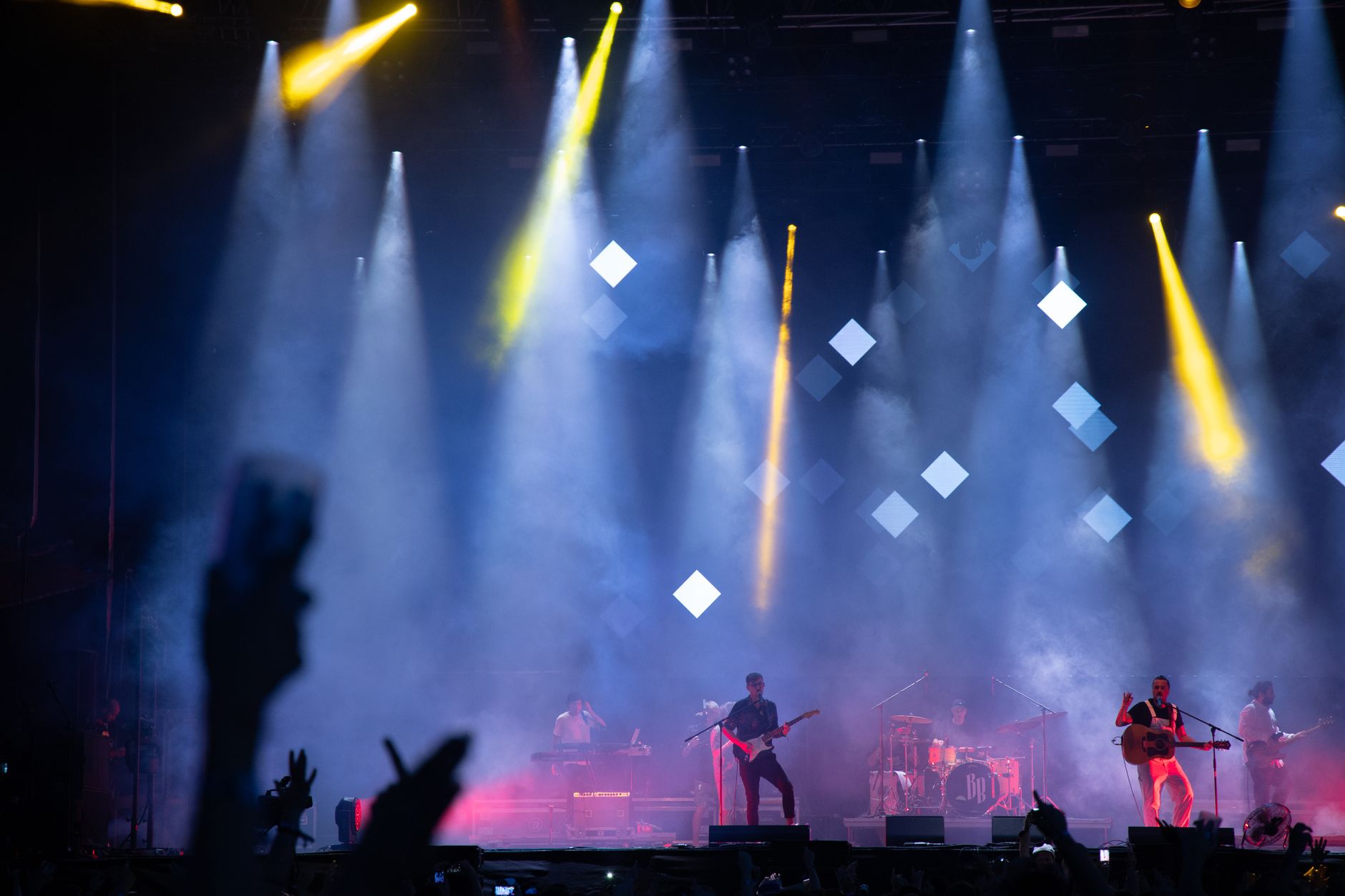 Michael X performing under stage lights